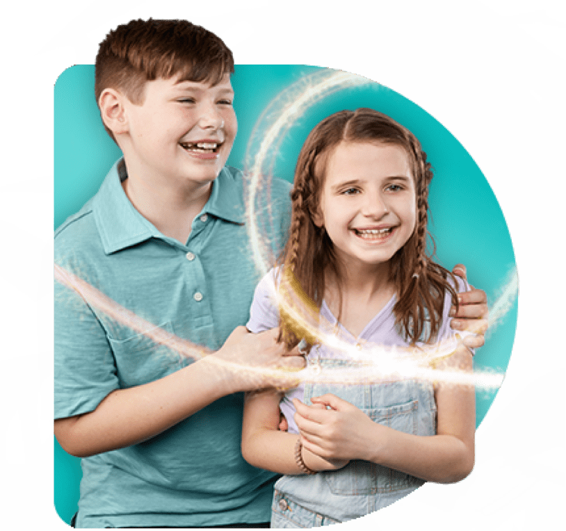 Kate, age 9, living with Rett syndrome, with her brother
