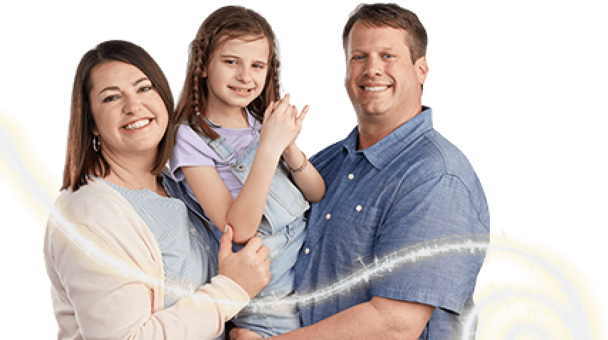 Kate, age 9, living with Rett syndrome, with her parents